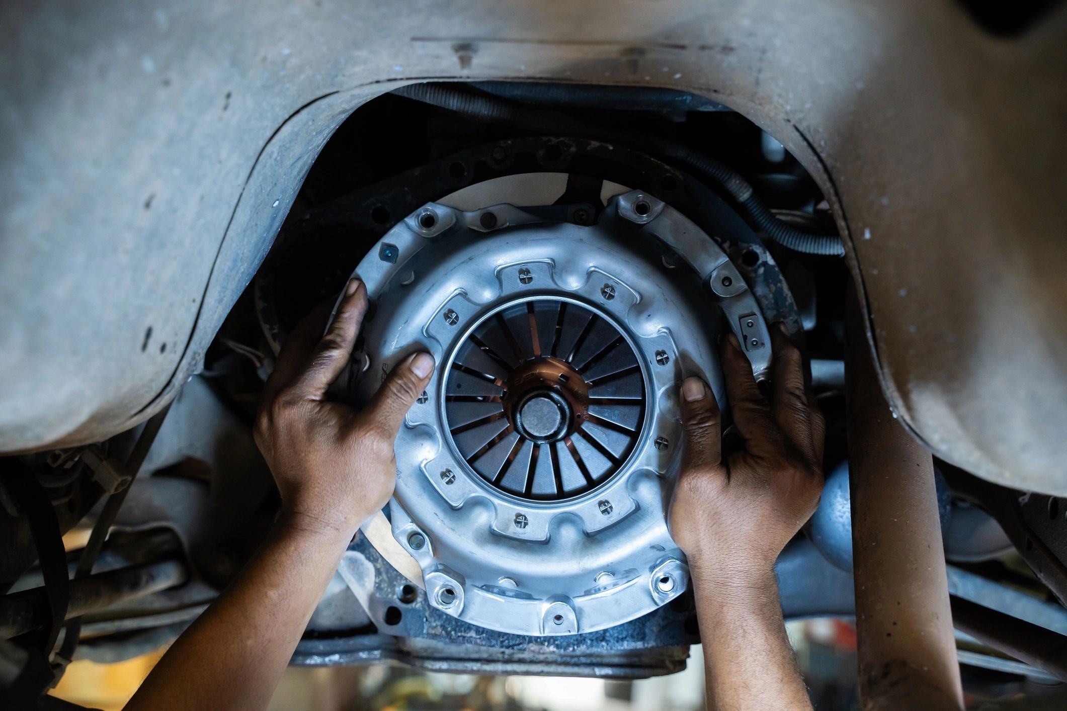 Mechanic holding clutch assembly parts